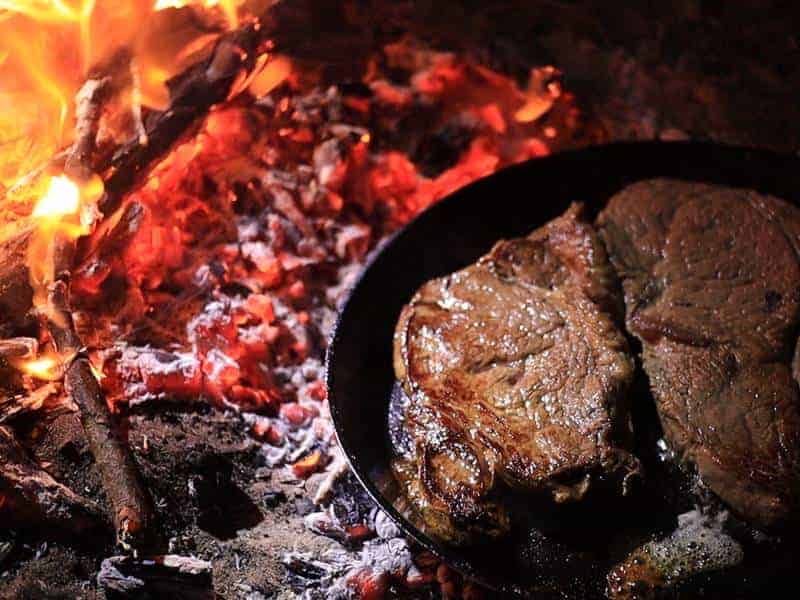Campfire cooked steak